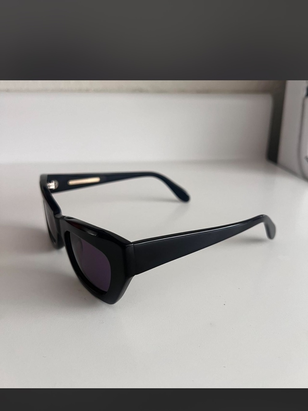 BCBGMaxAzria Black Frame Sunglasses with Dark Purple Lenses - Picture 4 of 7